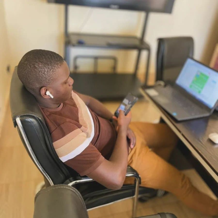 Mwesigwa Lewis working